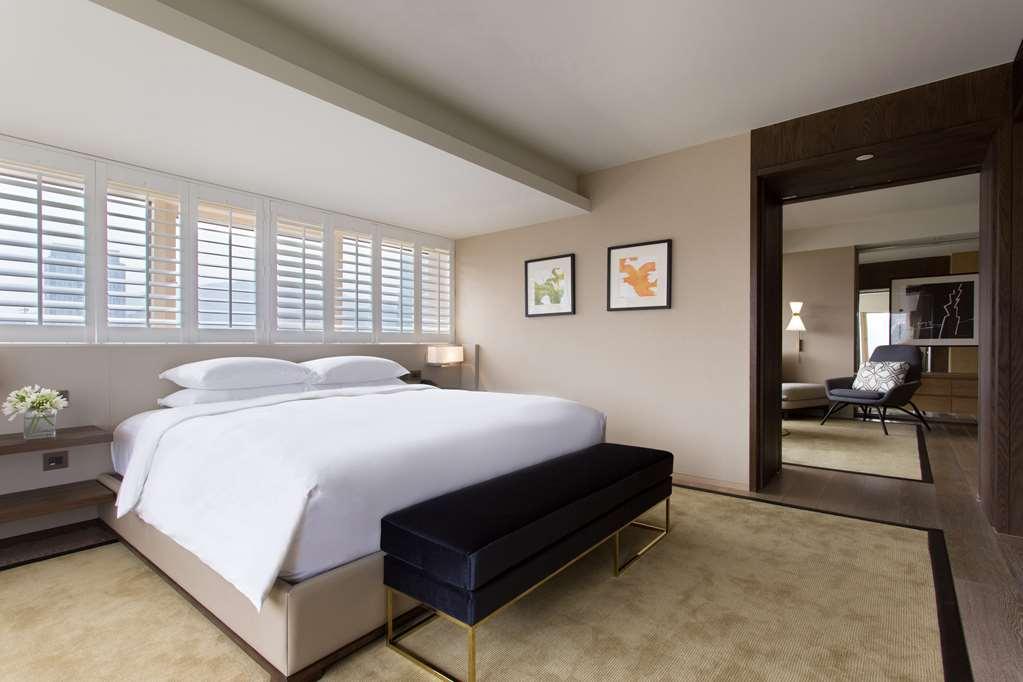 Grand Hyatt Taipei Otel Oda fotoğraf A bedroom at the hotel